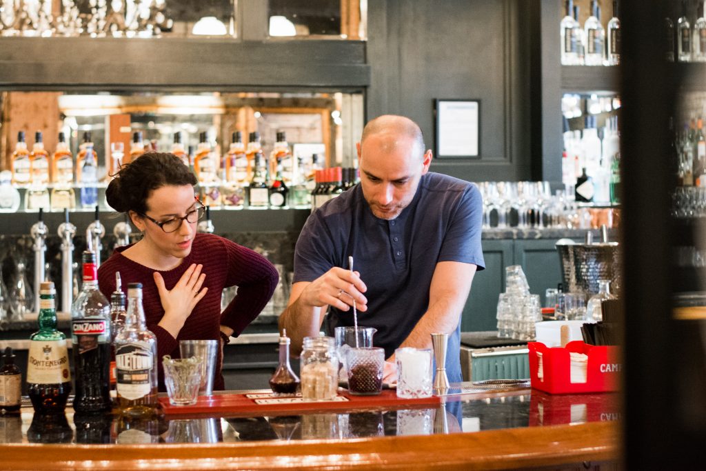 Making a whisky cocktail at The Distillery Bar + Kitchen